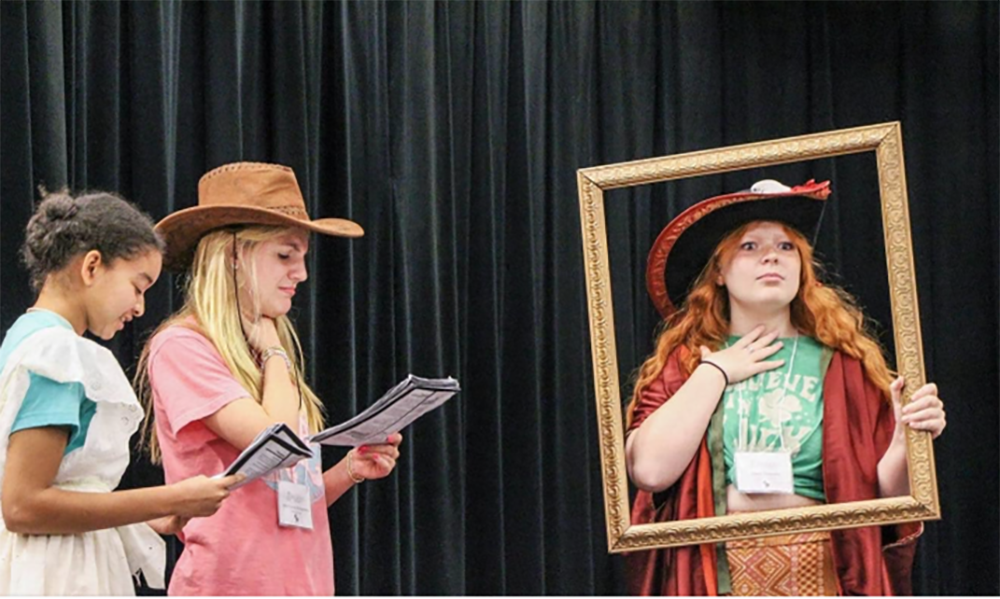Summer camp students participate in acting class