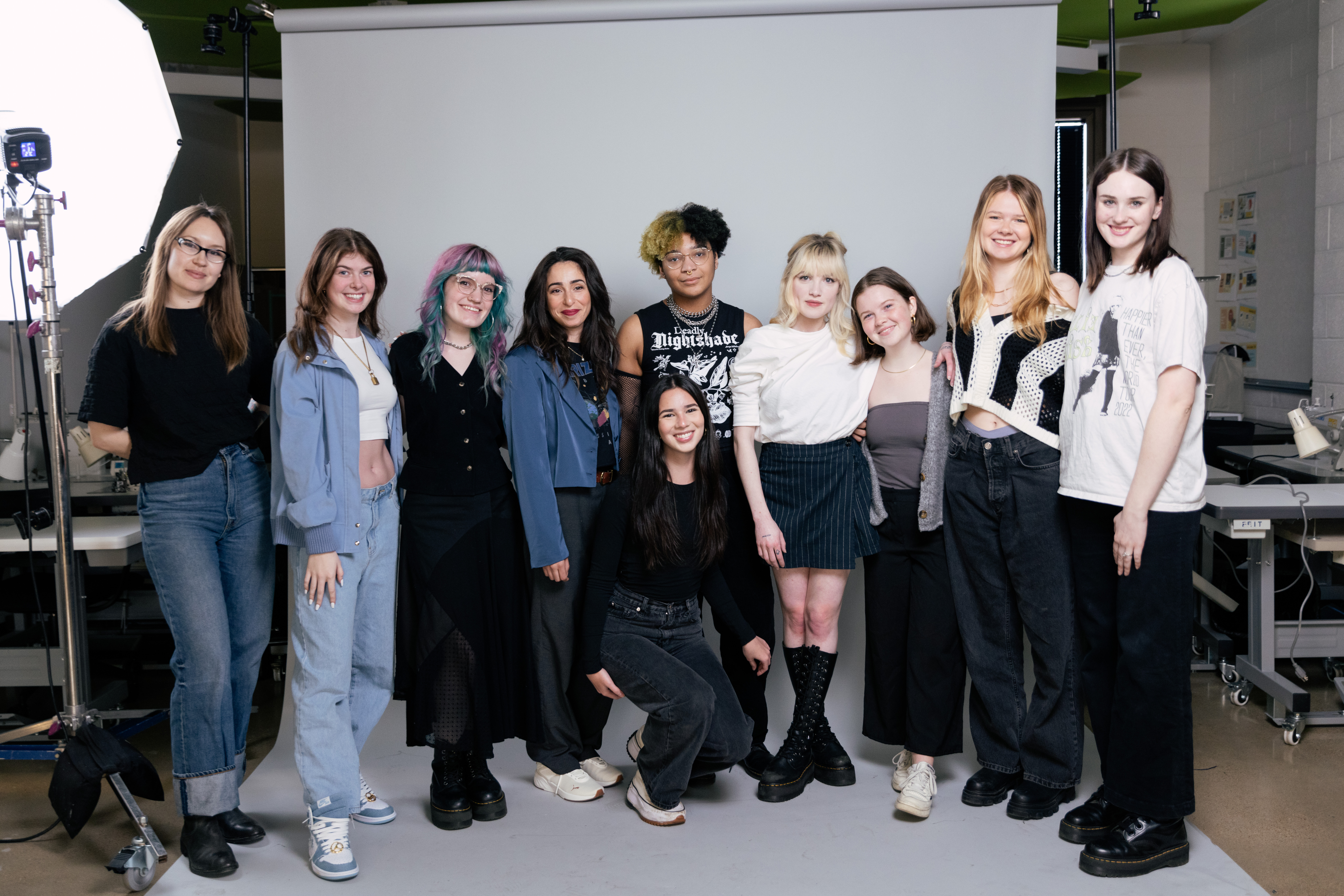 Junior and senior student designers gathered for group photo as promotion for the 2023 Fashion Show