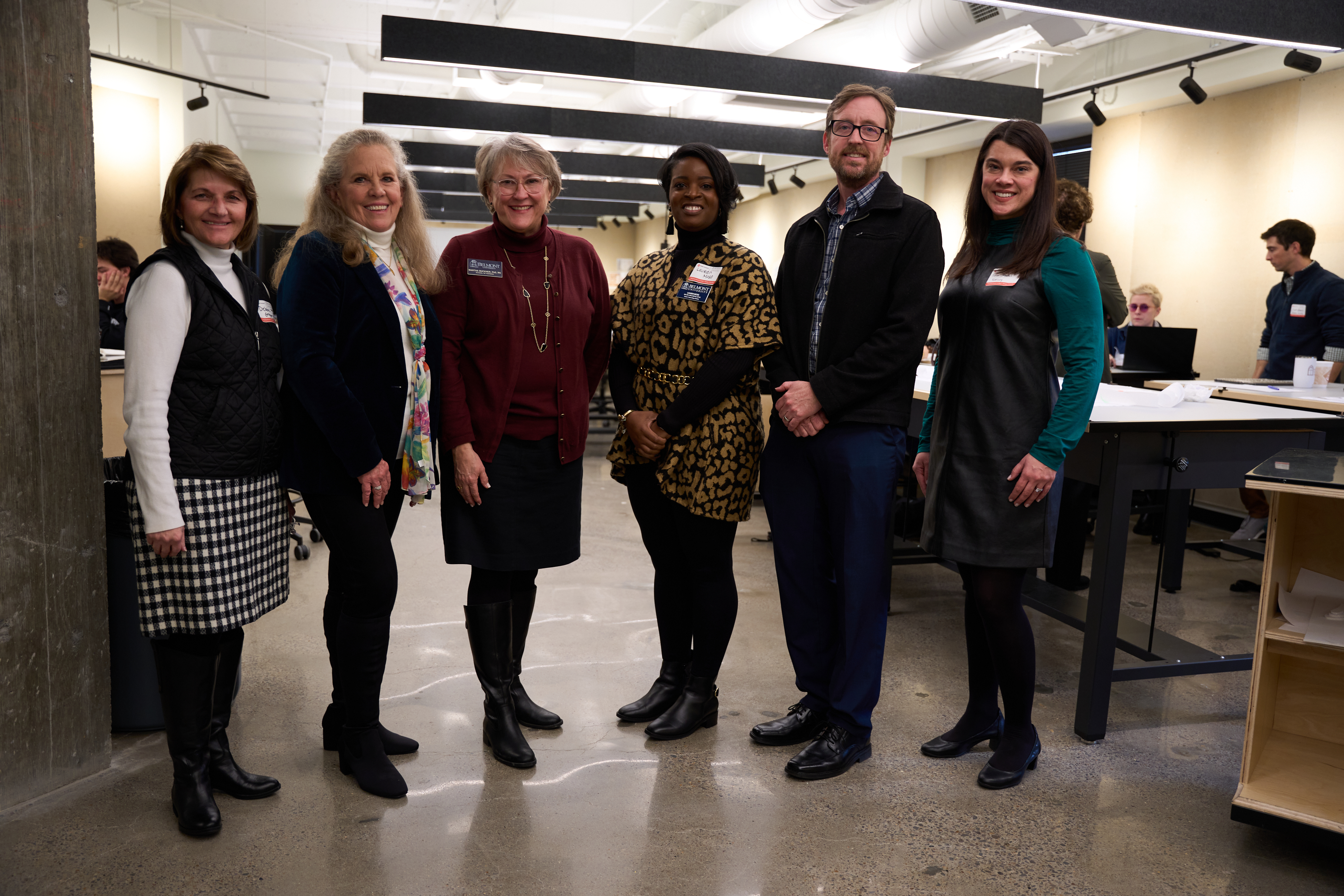 Belmont faculty stand side by side in the Gabhart studios