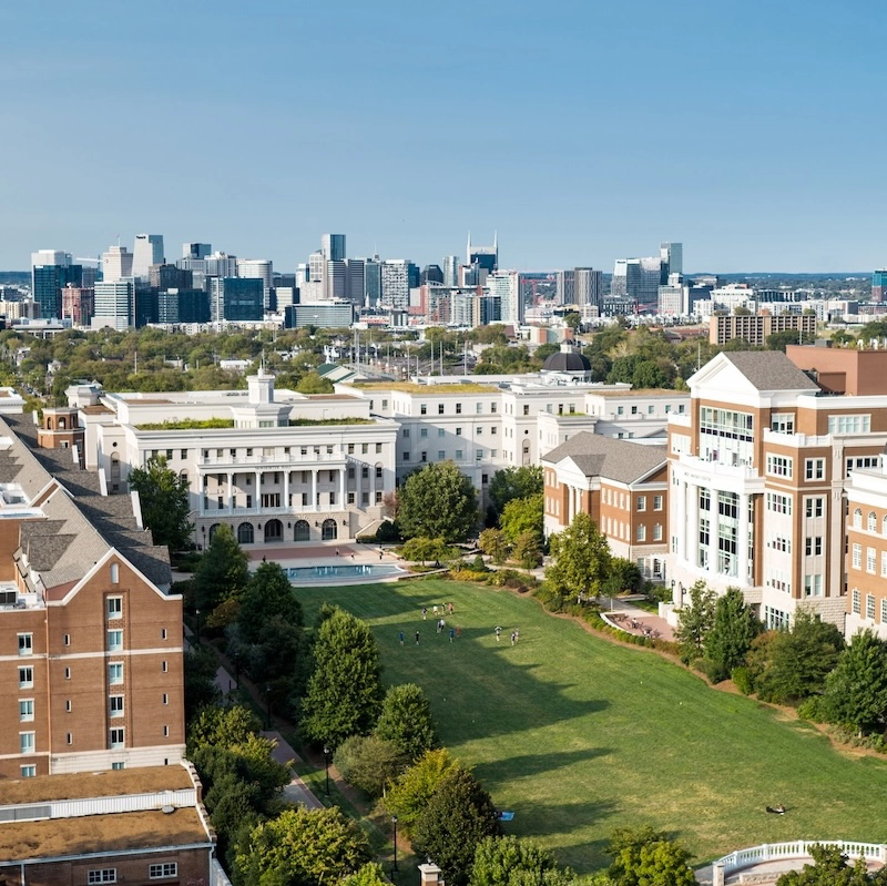 drone shot of belmont's lawn with Nashville skyline in the background