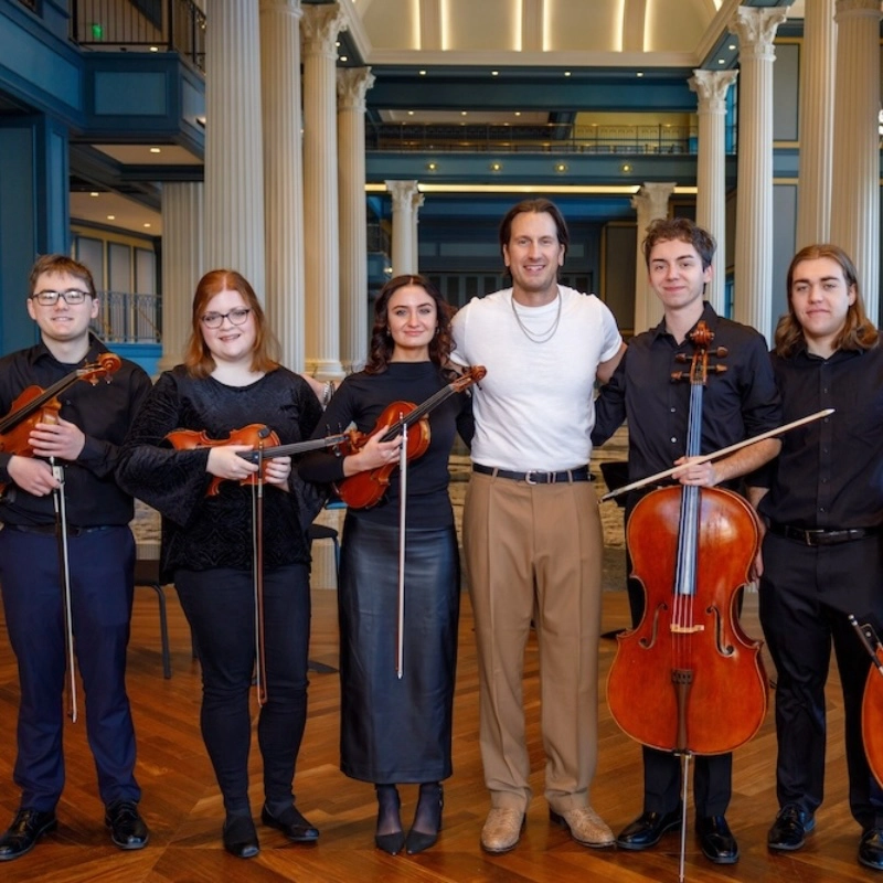 Dickerson with student musicians.