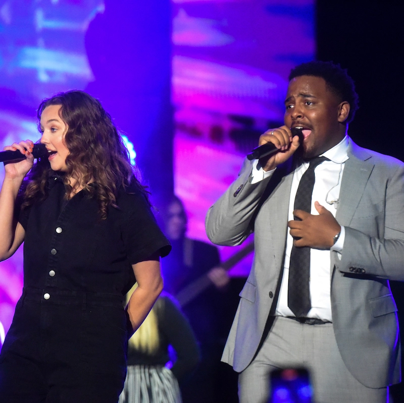 Students singing at a concert