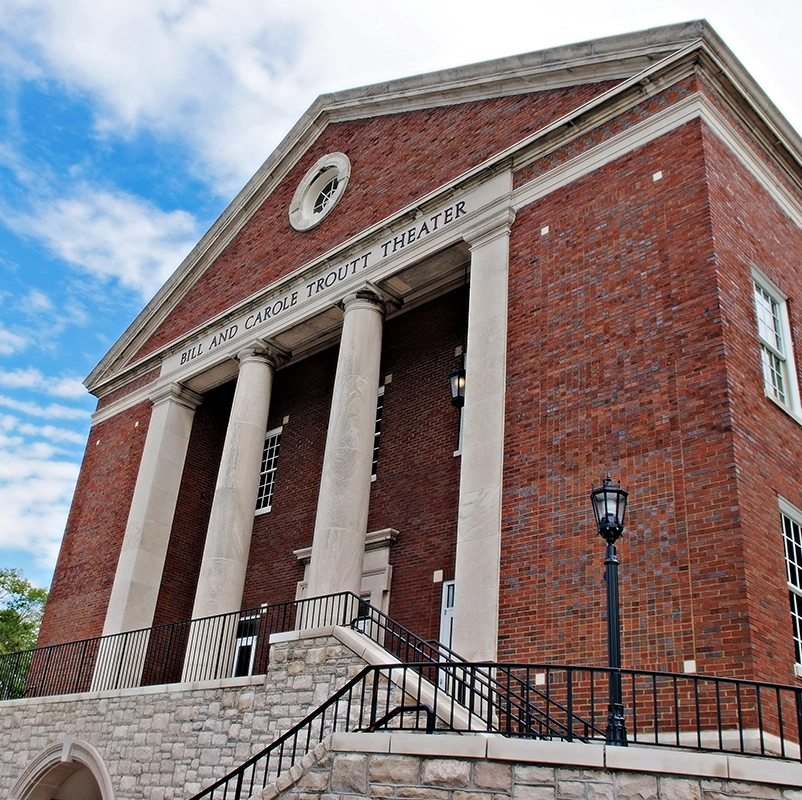 An image of the Troutt Theatre from the front of the building with a blue sky in the background.