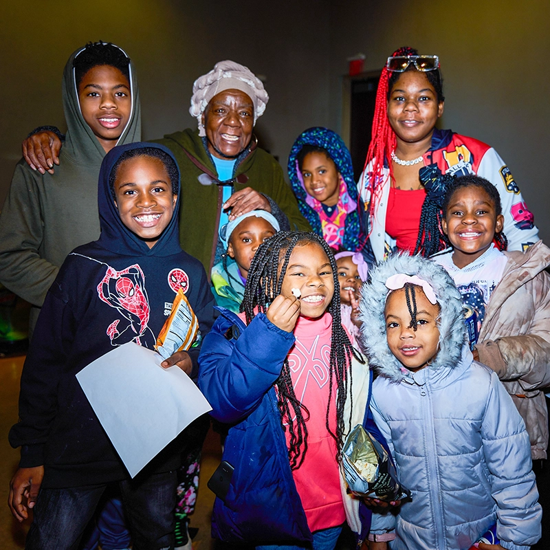 Young children with their parents at Community Night