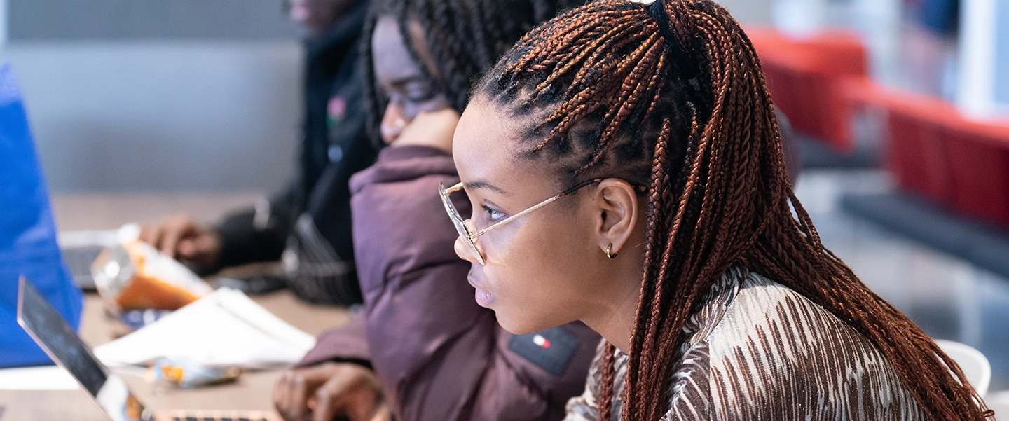 A young black female student at the Fisk-Belmont Social Justice Data Hackathon at Belmont University