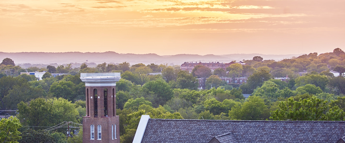 A beautiful sunset withthe Belmont tower in the foreground.