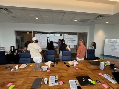 Group of people working on a problem