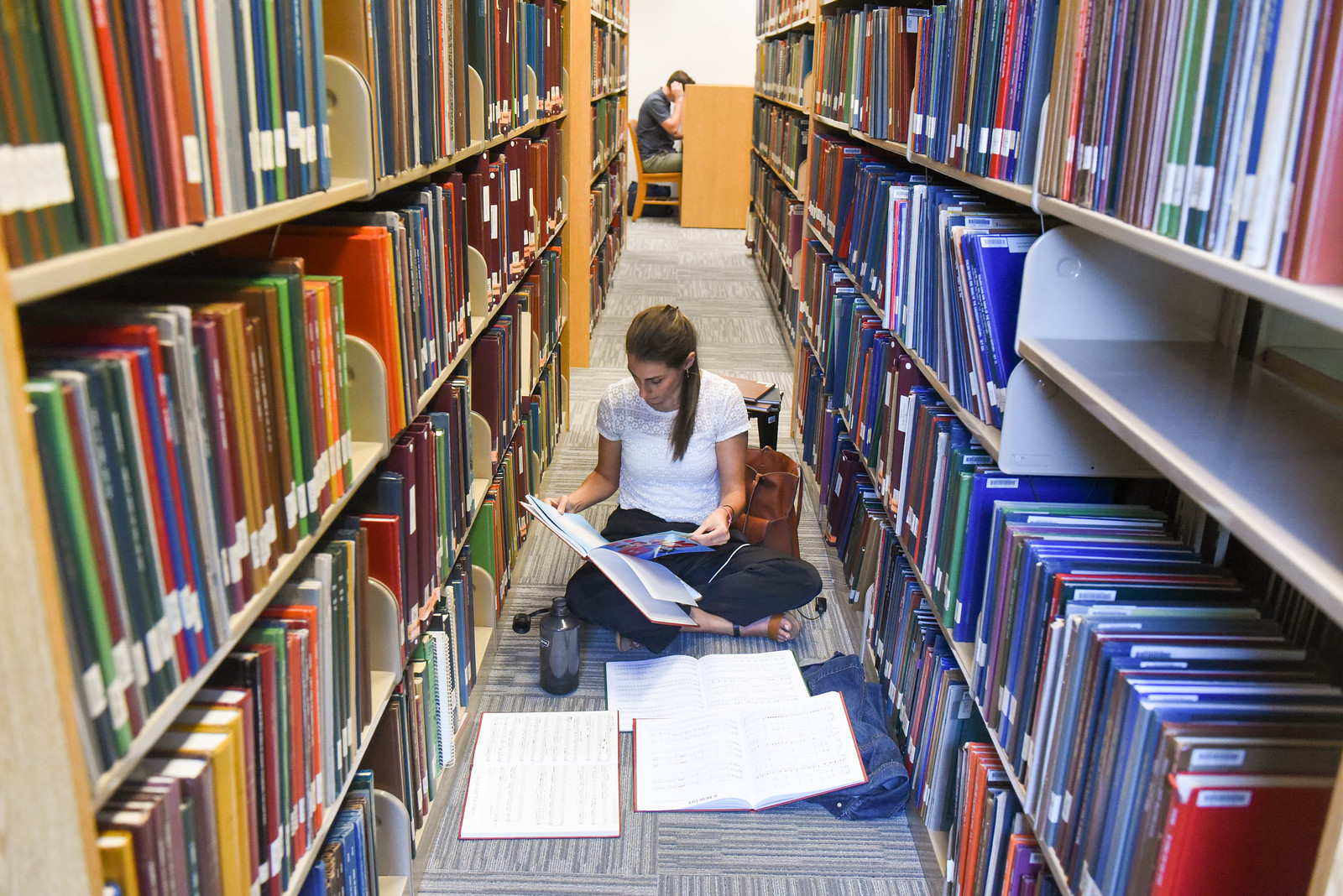 student doing research at Lila D. Bunch Library