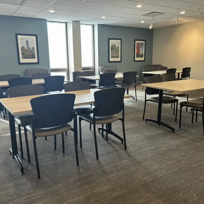 Tables and chairs in the Lila D. Bunch Library lobby.