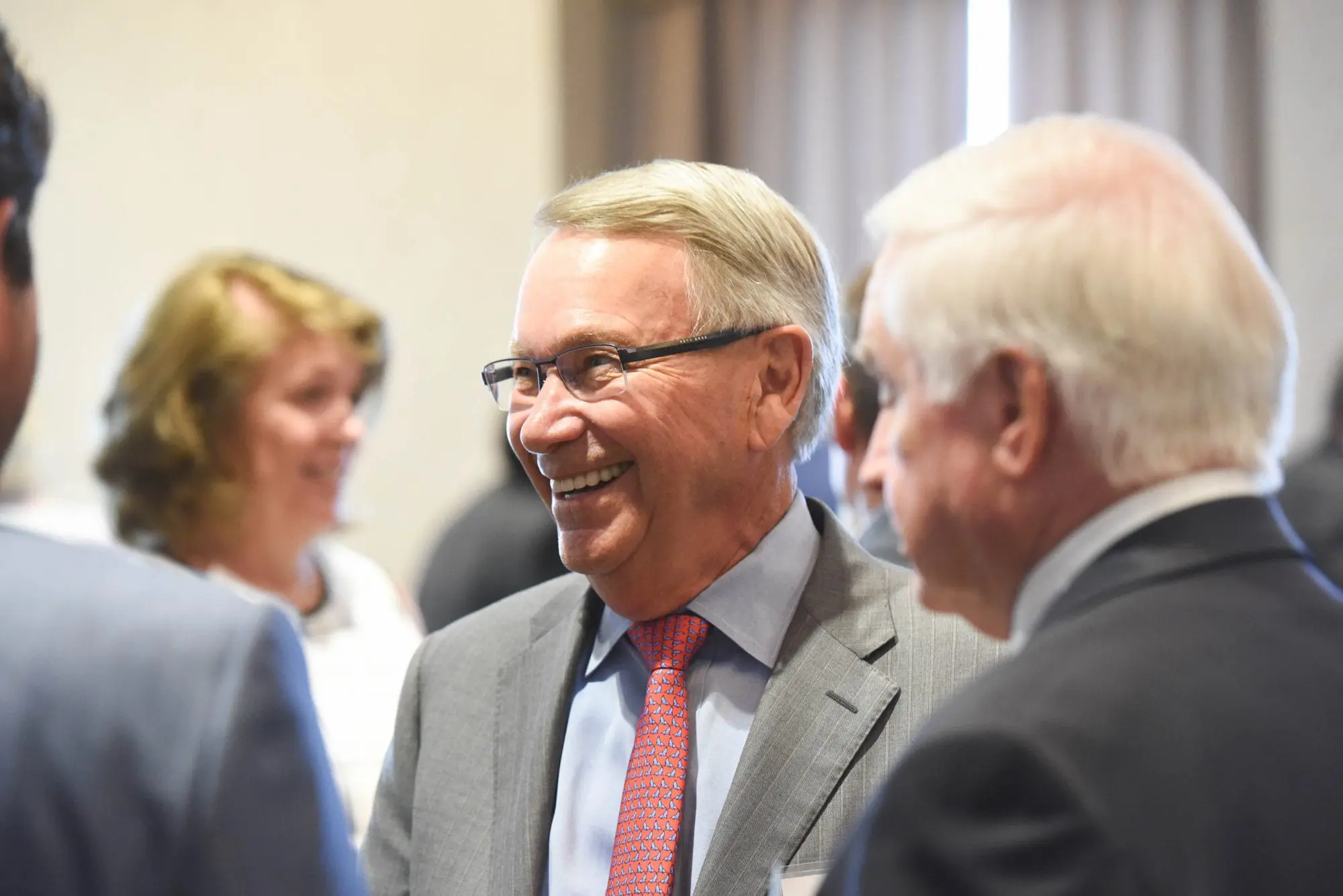 Mr. Beasley talks with friends during a reception for him and his family for their donation to the Thomas W. Beasley Institute for Free Enterprise at Belmont University in Nashville, Tennessee, June 14, 2018.
