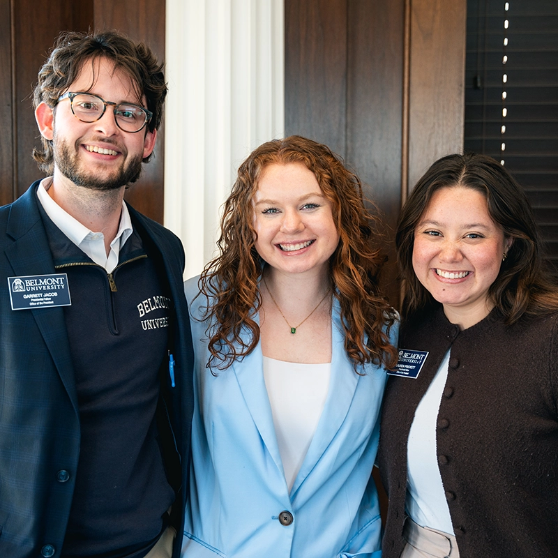 Presidential Fellows pose for a photo with Libby Godo