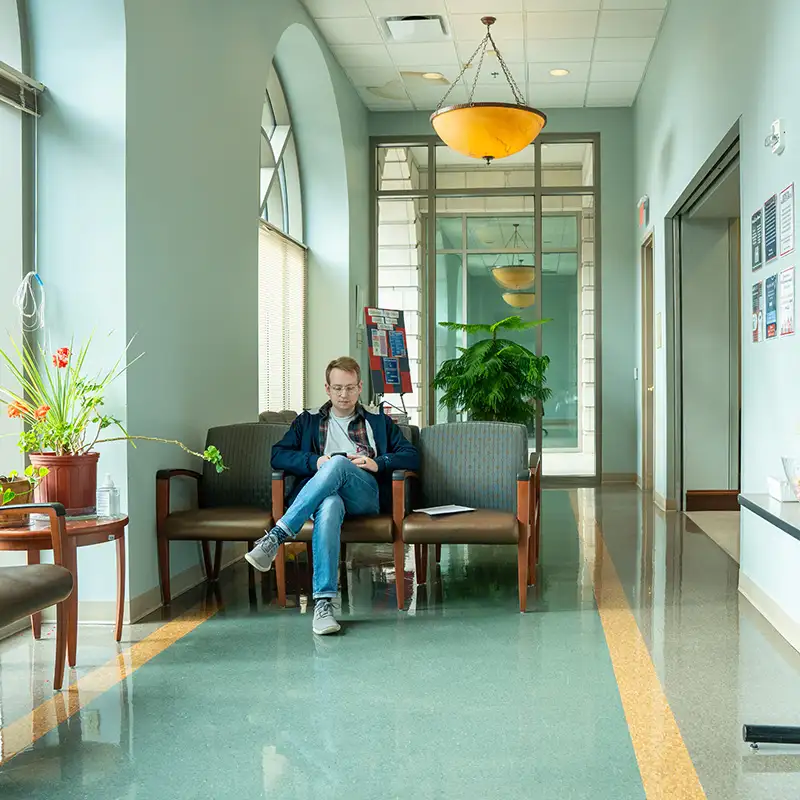 Patient sitting in waiting room