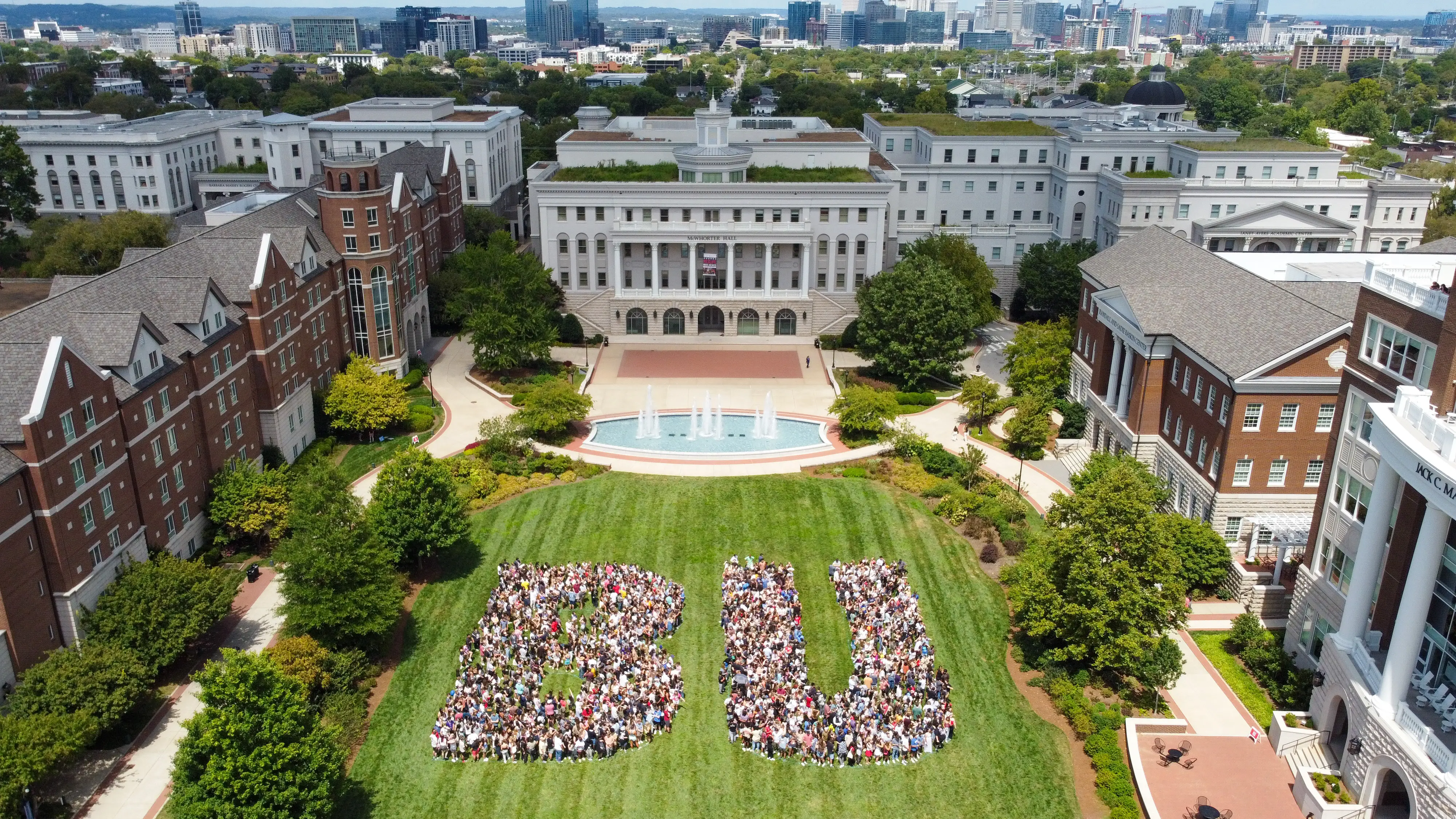 Drone shot of campus with students forming the letters "BU"