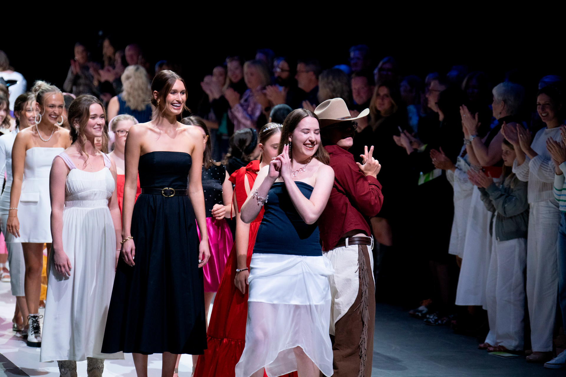 GiGi's participants and designers on the runway