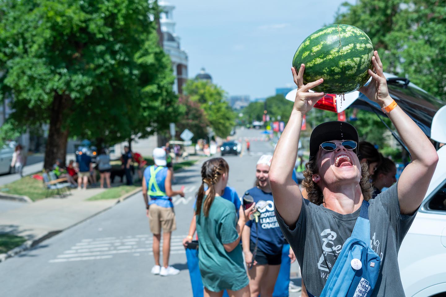 student with a watermelon