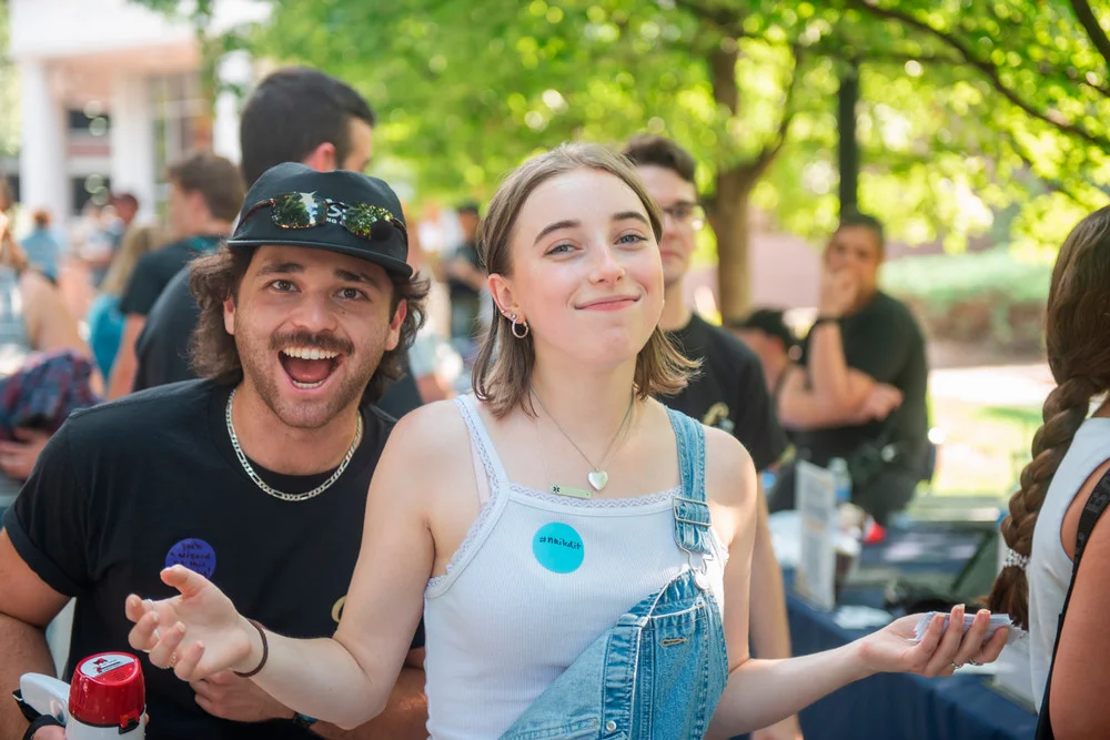 male student and female student smile