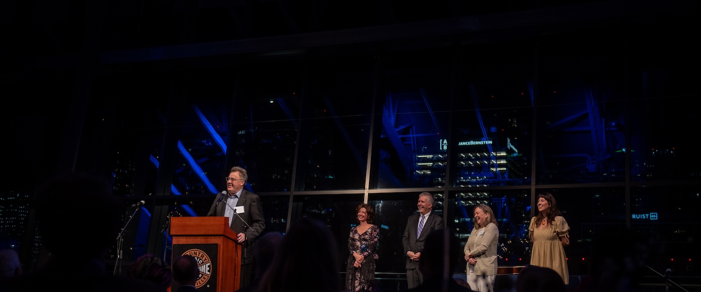 Vince Gill at podium, Amy Grant, Greg Jones, Susan Jones, Corinna Grant Gill