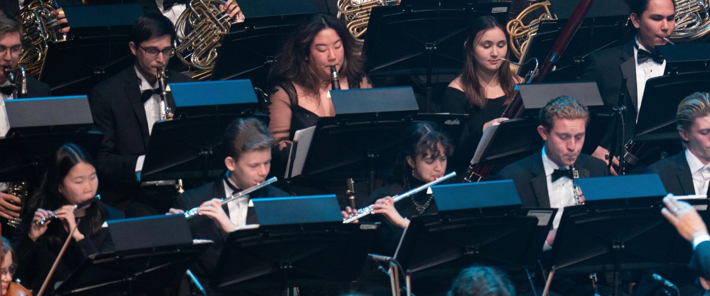 Jake King performs in orchestra