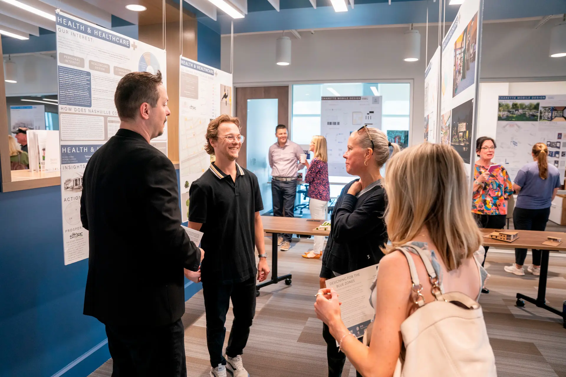Students presenting the exhibit