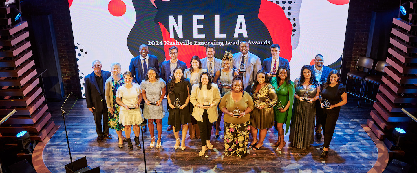 NELA winners on stage