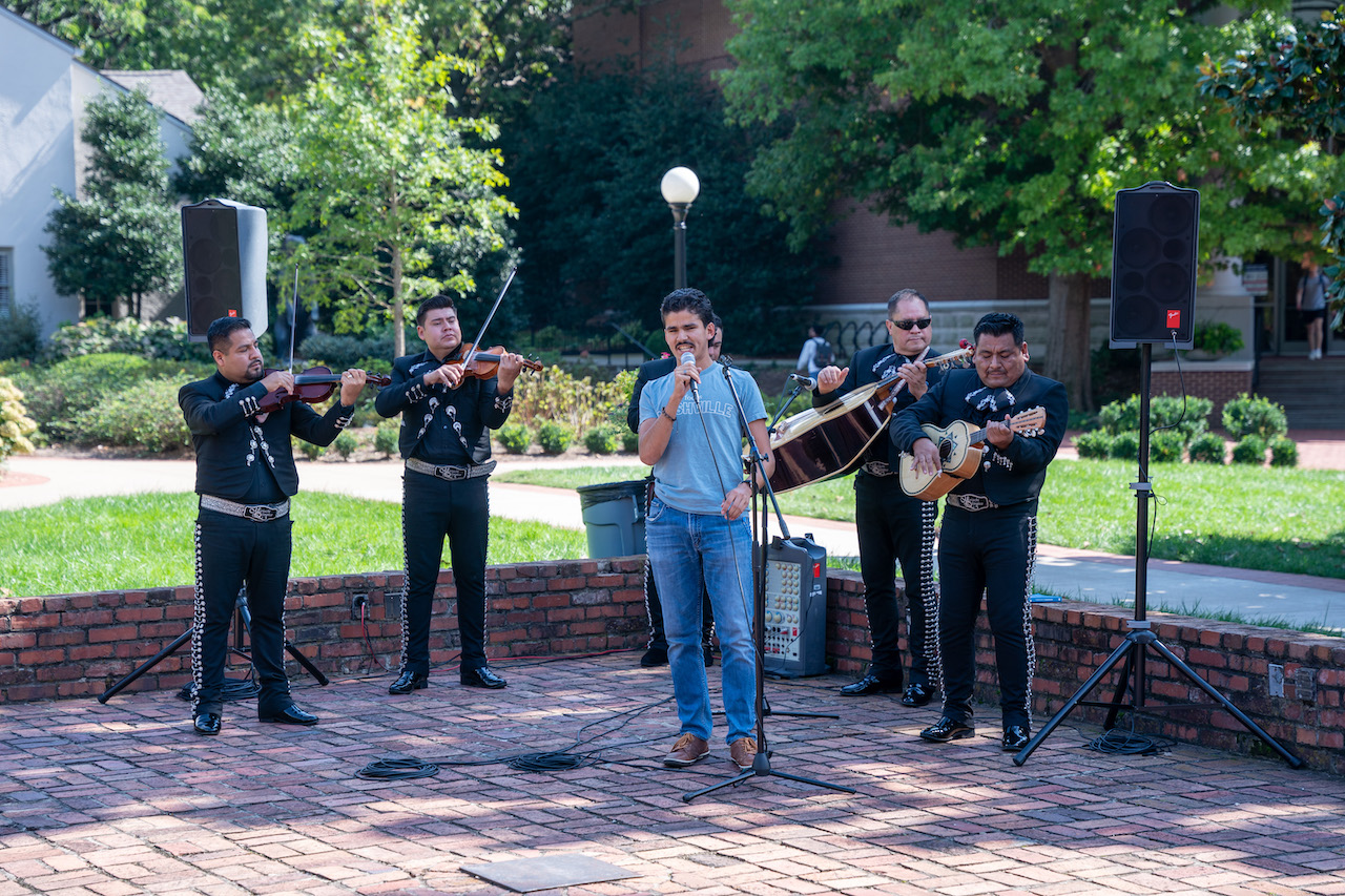 Mariachi singer and band