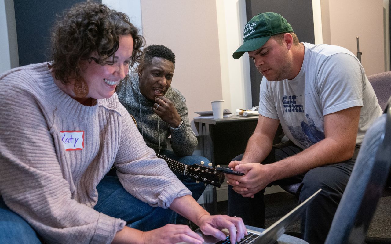 Songwriters write a song together during The Friendship Project