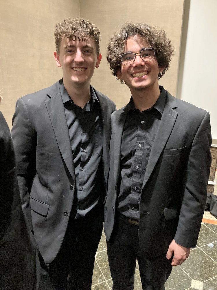 two friends at a recital