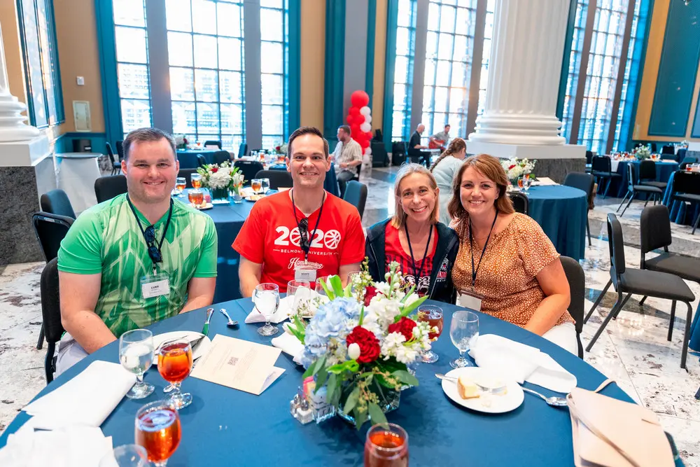 Group of people seated a banquet table