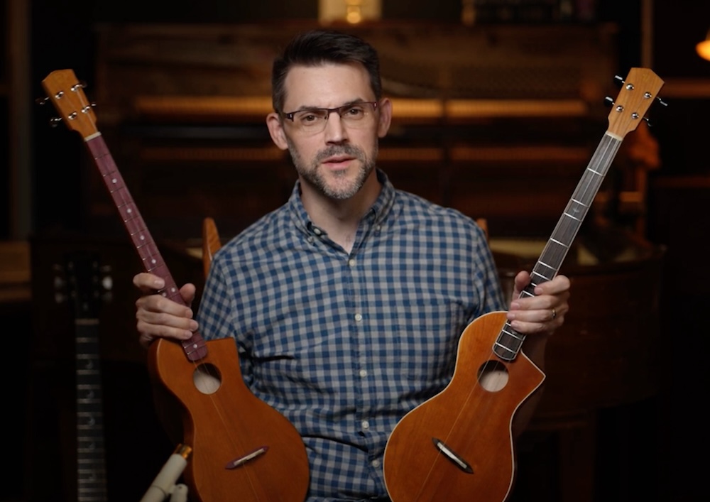 ryan pryor holding both versions of his instrument