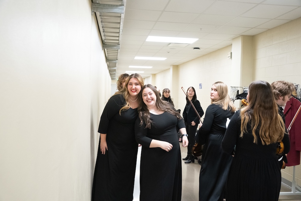 singers hanging out backstage