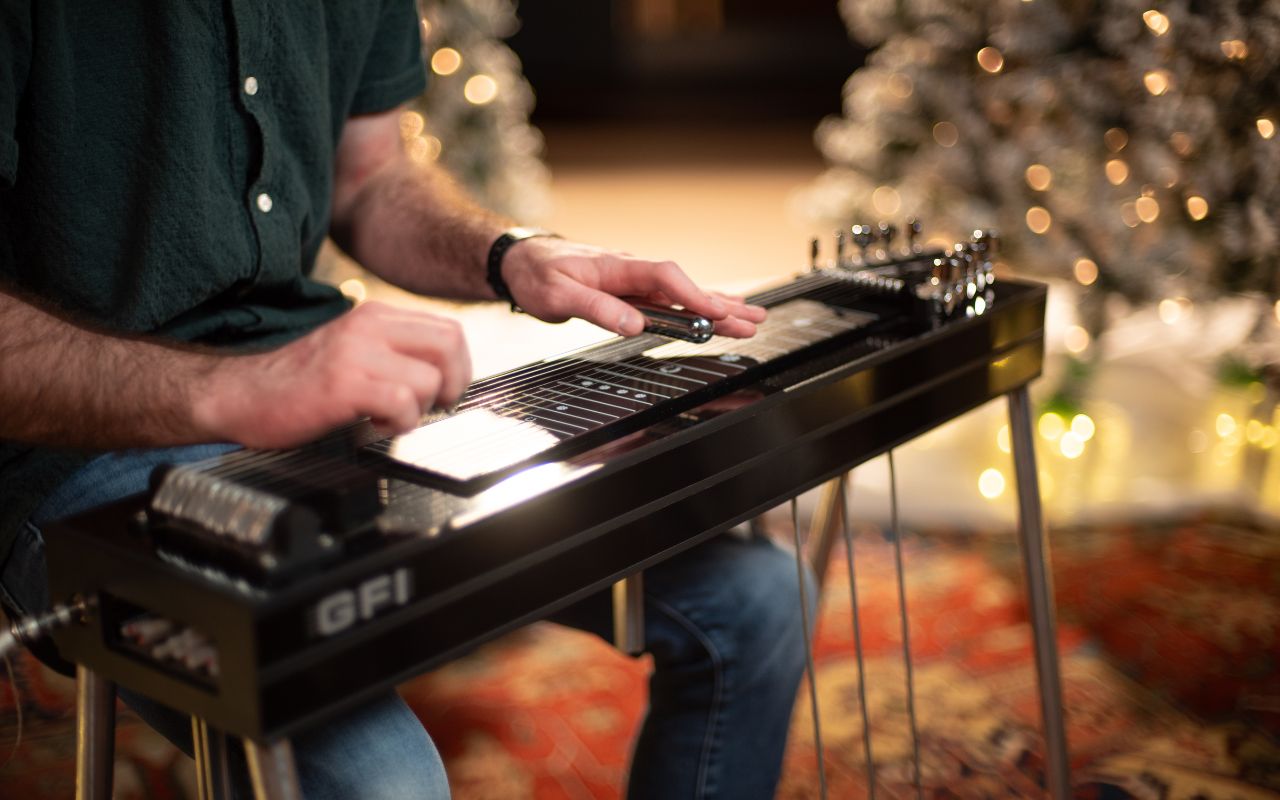 Close up of pedal steel guitar playing