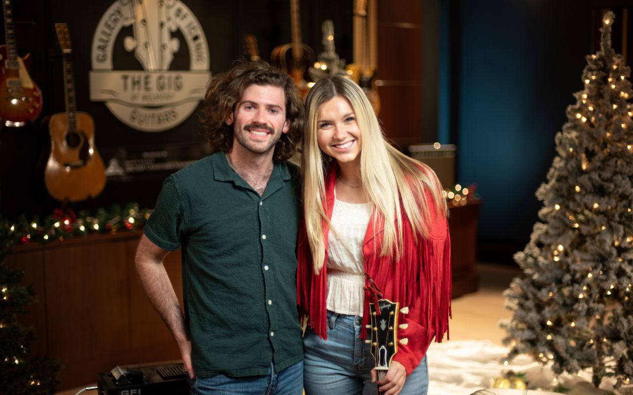 Emmy Moyen and Lucas Rennie pose for a photo