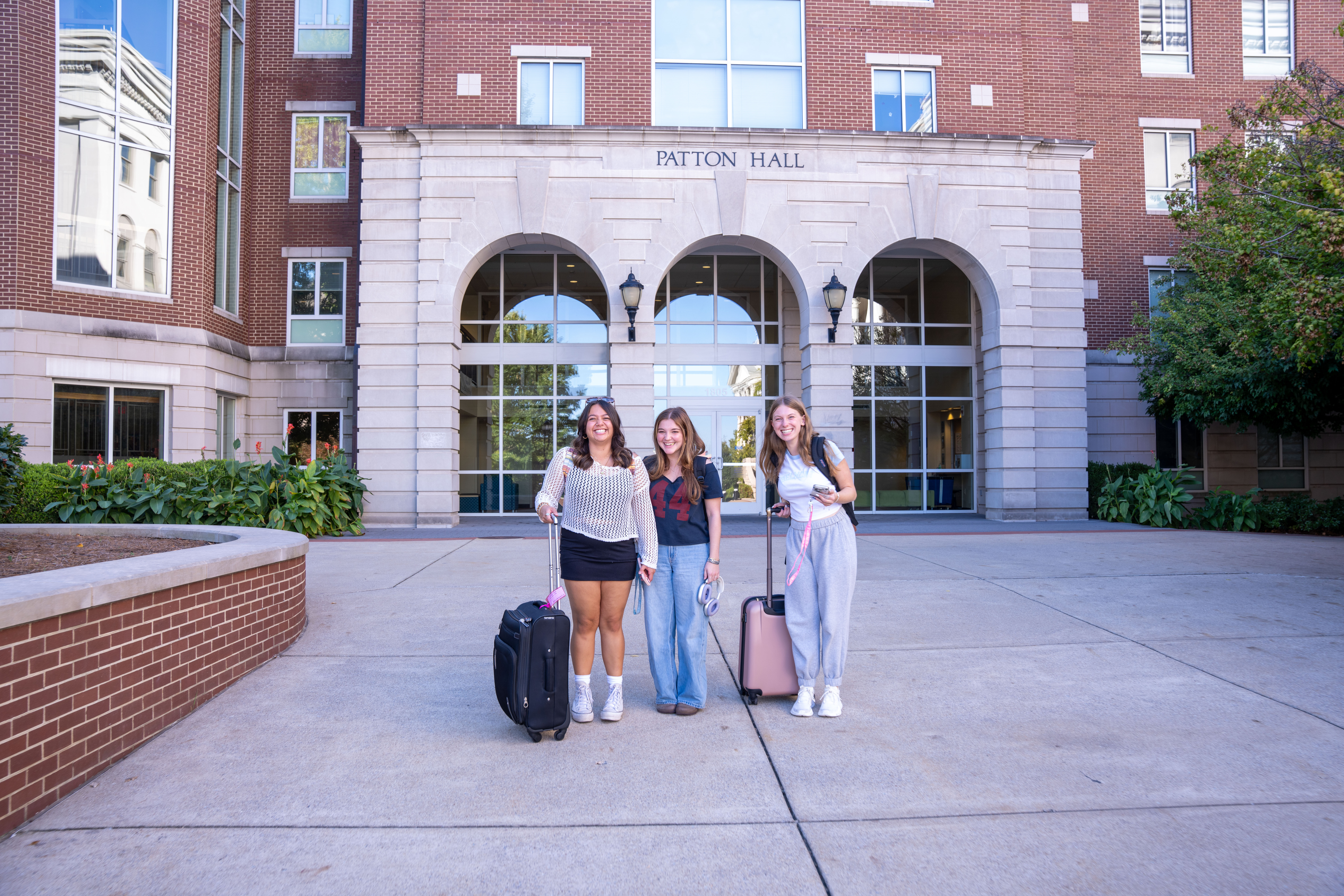 students with suitcases