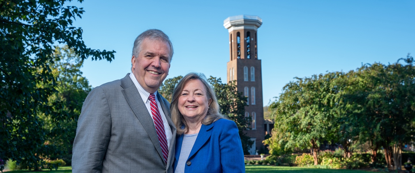 Greg and Susan Jones in front of Bell Tower
