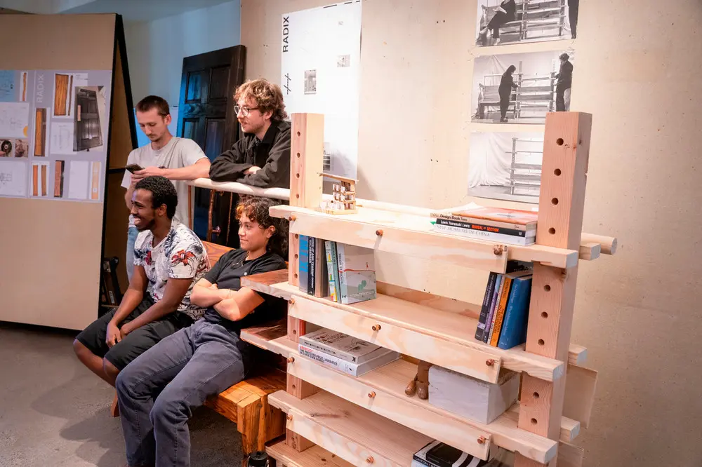 O'More students showing their full-scale tangible designs for their joint studio project