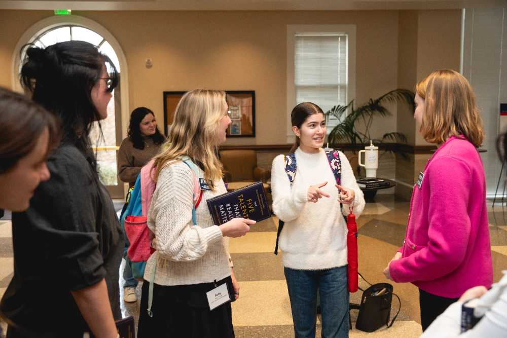 Social entrepreneurship students discussing at the Massey Pow