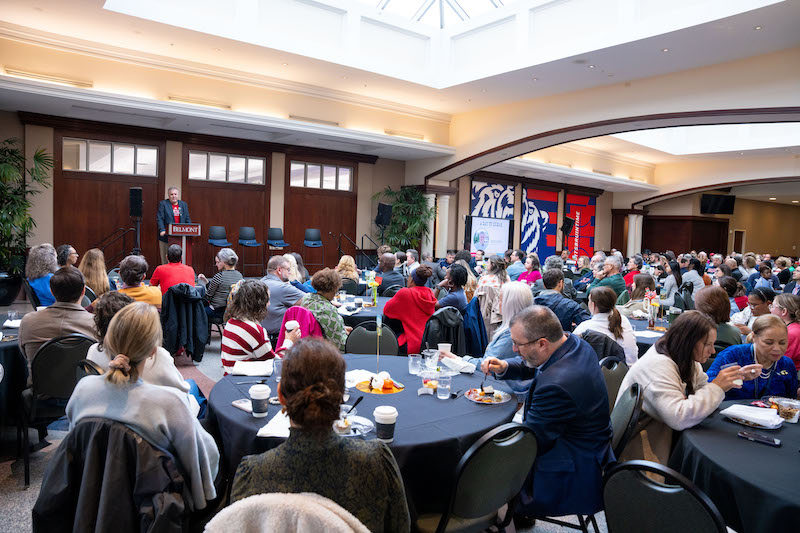 Dr. Jones speaks before faculty and staff at brunch