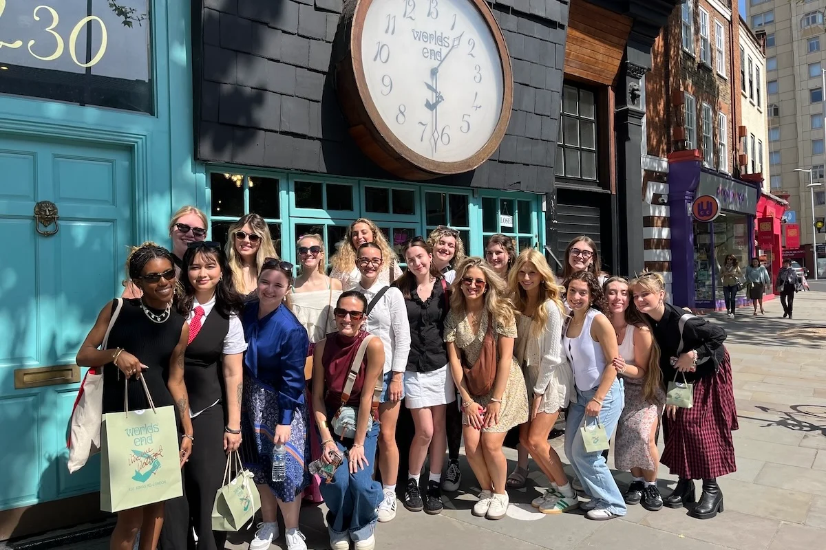 Students from Belmont’s O’More College pose outside the iconic World’s End boutique during a study abroad trip to London as part of a fashion-focused Maymester program.