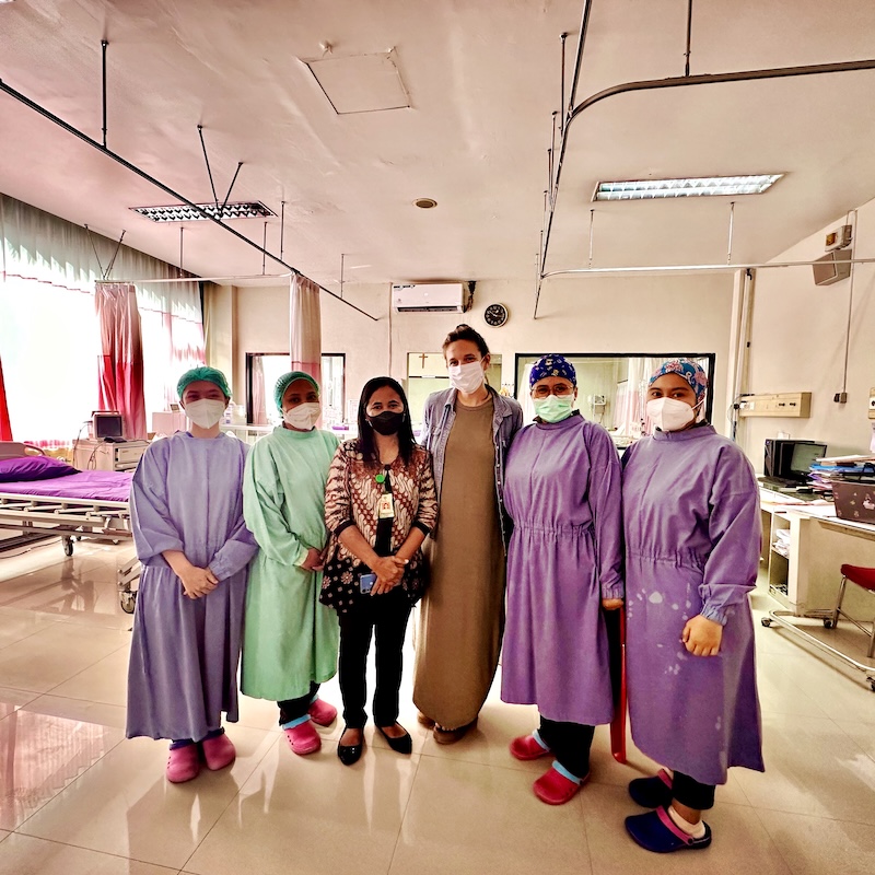 Dambrino with partners at health care clinic