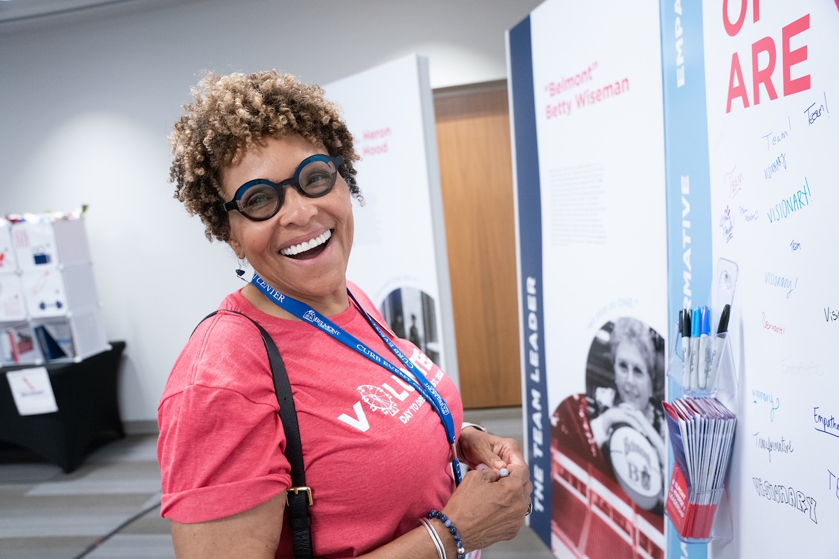 Joyce Searcy smiles while visiting exhibit