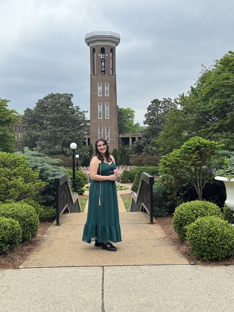Lockney in front of Belmont's Bell Tower