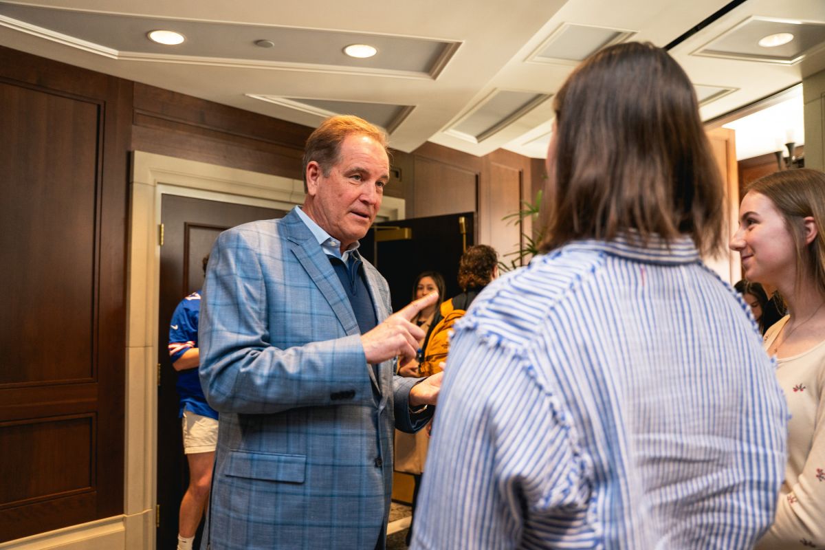 Nantz talking with students after seminar.