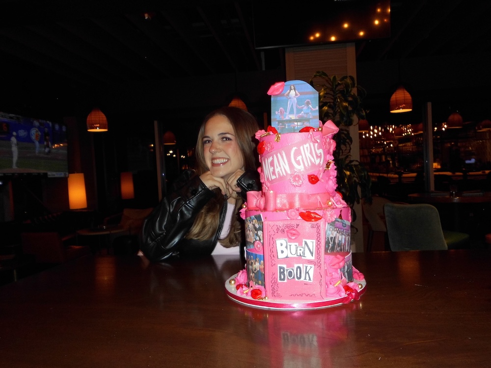 Yeomans with a cake celebrating the close of the show