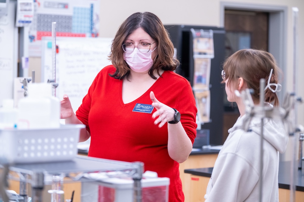Dr. Garrett works with a student