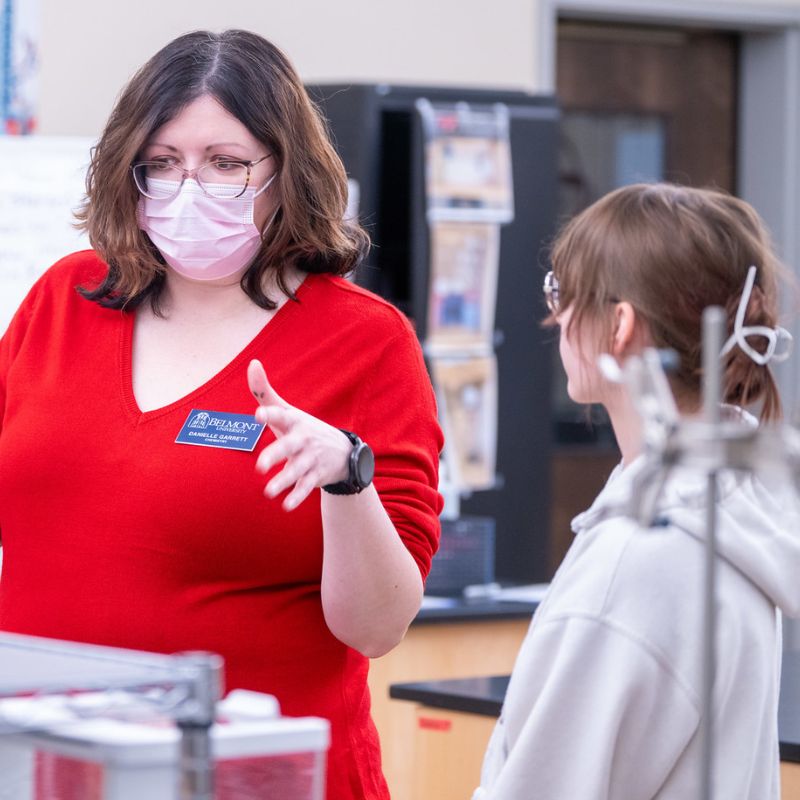 Dr. Danielle Garrett works with high schools student