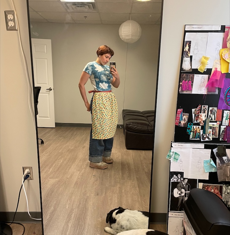 Margo with an apron she sewed