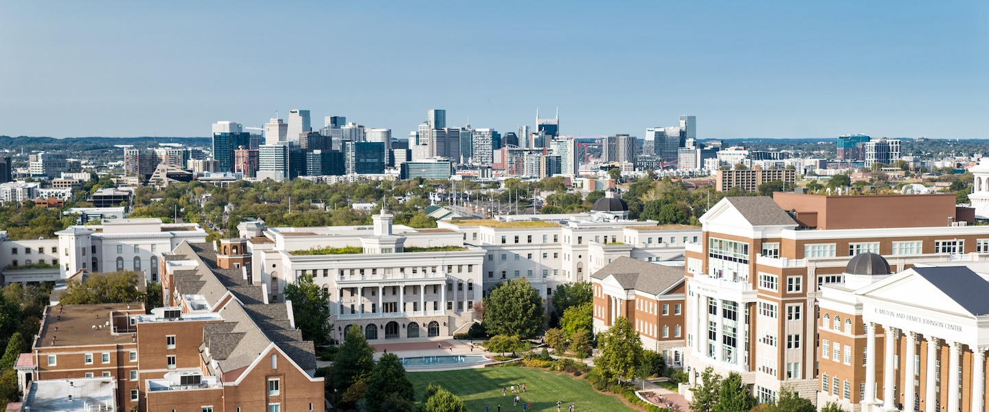 drone photo of the Belmont lawn with the Nashville skyline in background