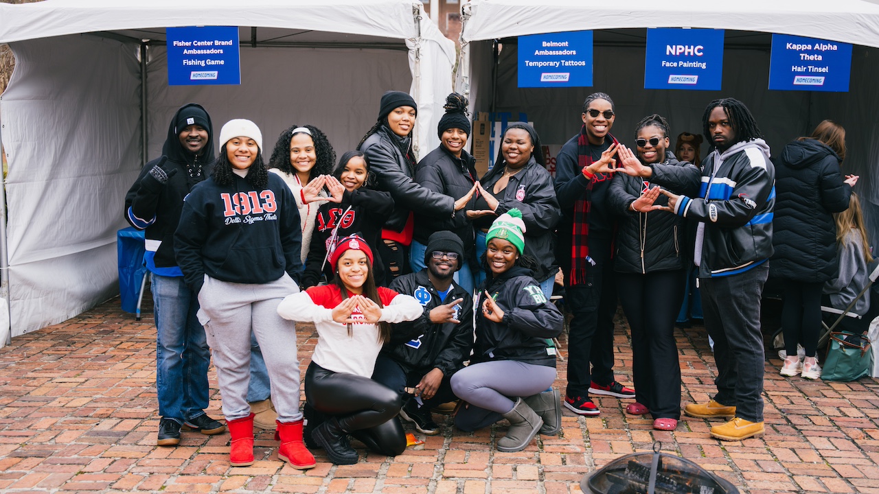 fraternity and sorority students at the student org tailgate