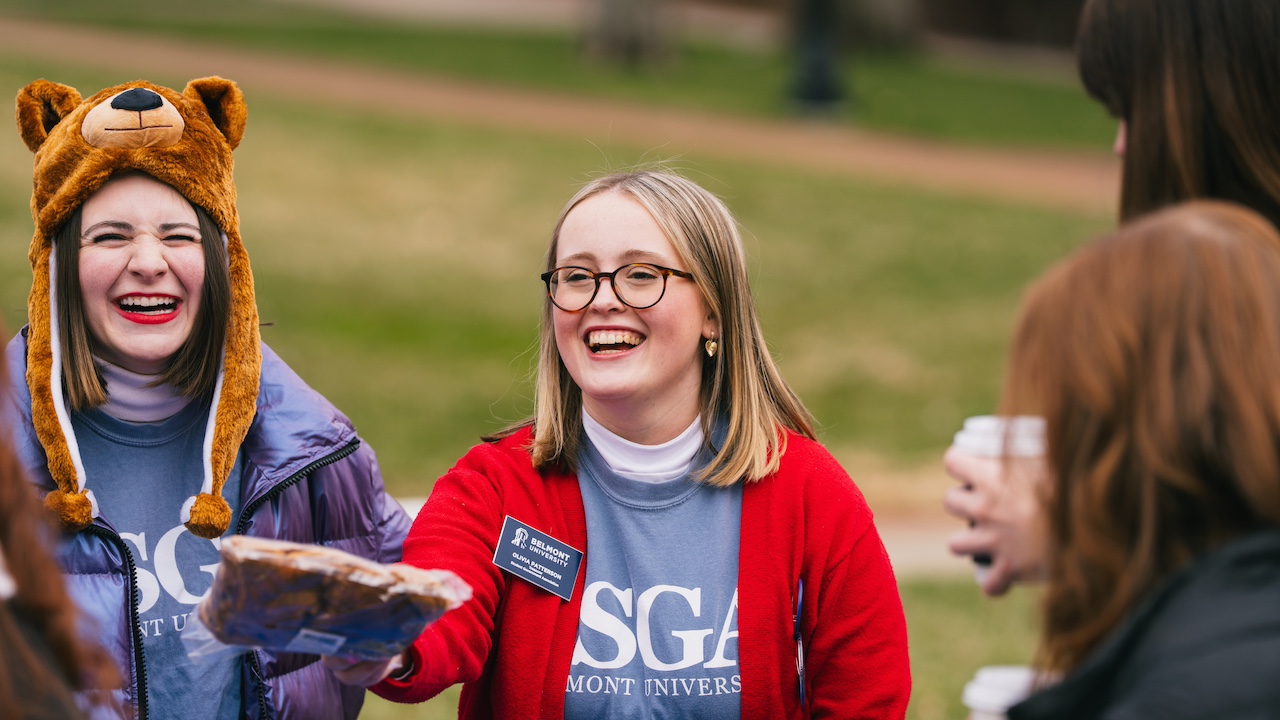 students celebrating at the student org tailgate