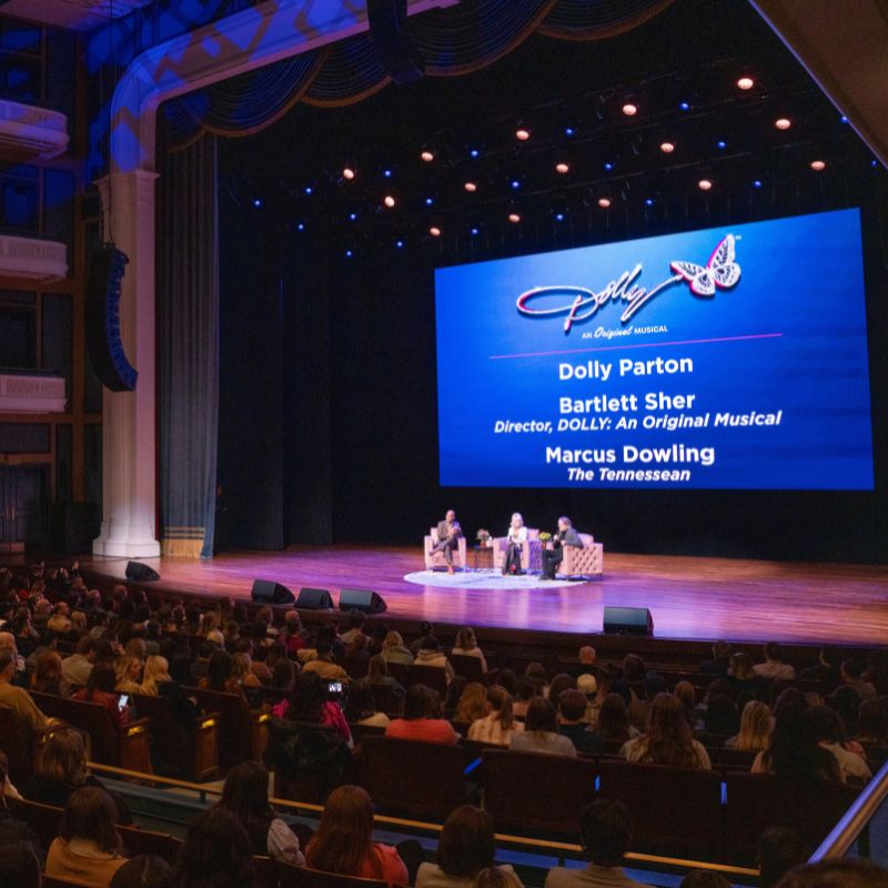 Dolly Parton on stage at the Fisher Center for the Performing Arts